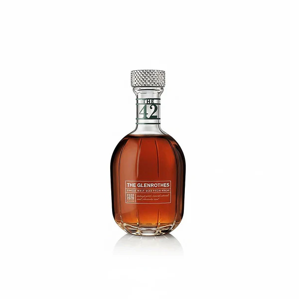The Glenrothes 42 Year Old premium collectible single malt Scotch whisky bottle. whiskey glasses